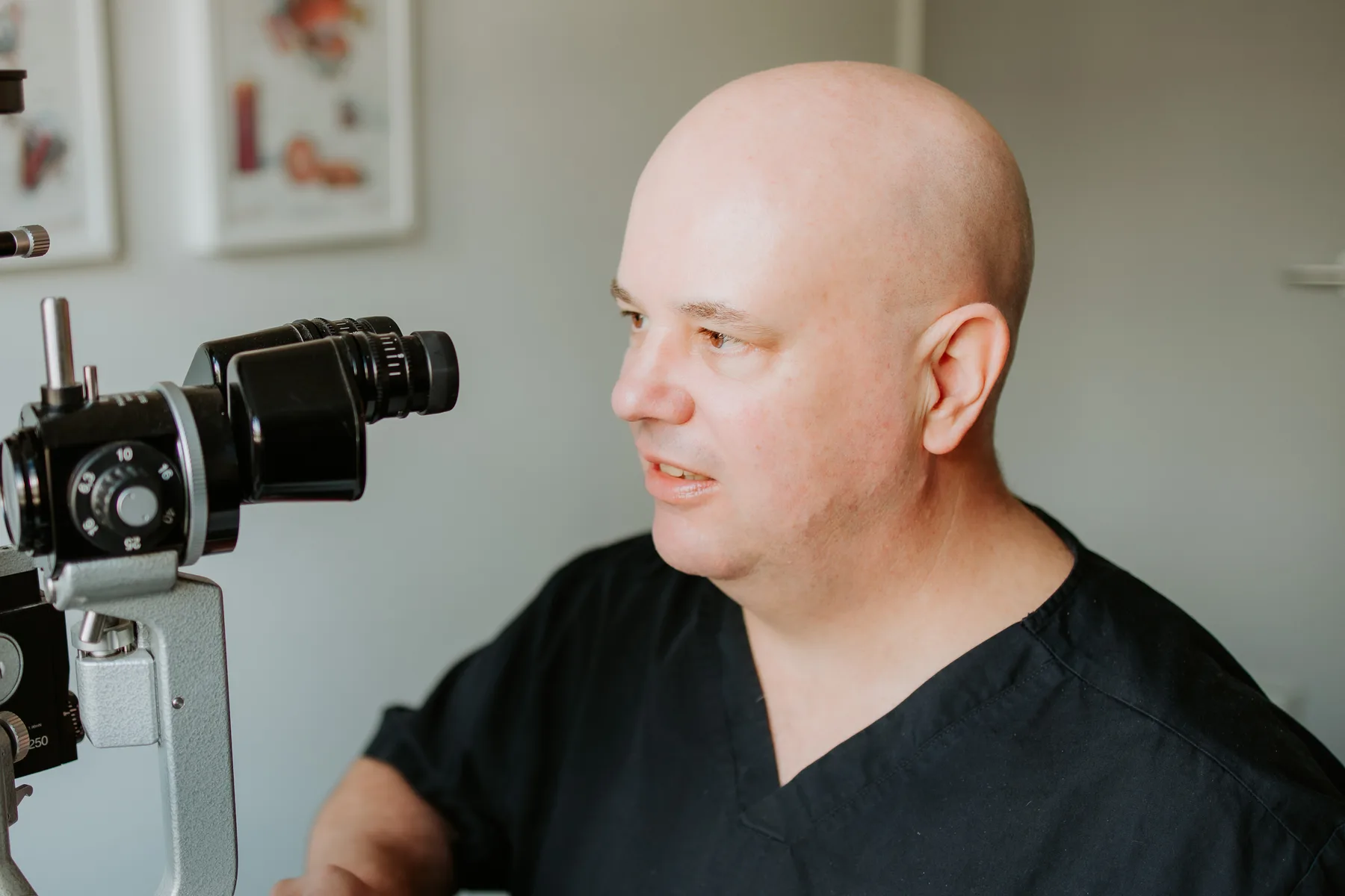 A/Prof Adrian Hunt, cataract surgeon, in his consulting rooms at Eye Surgeons Miranda