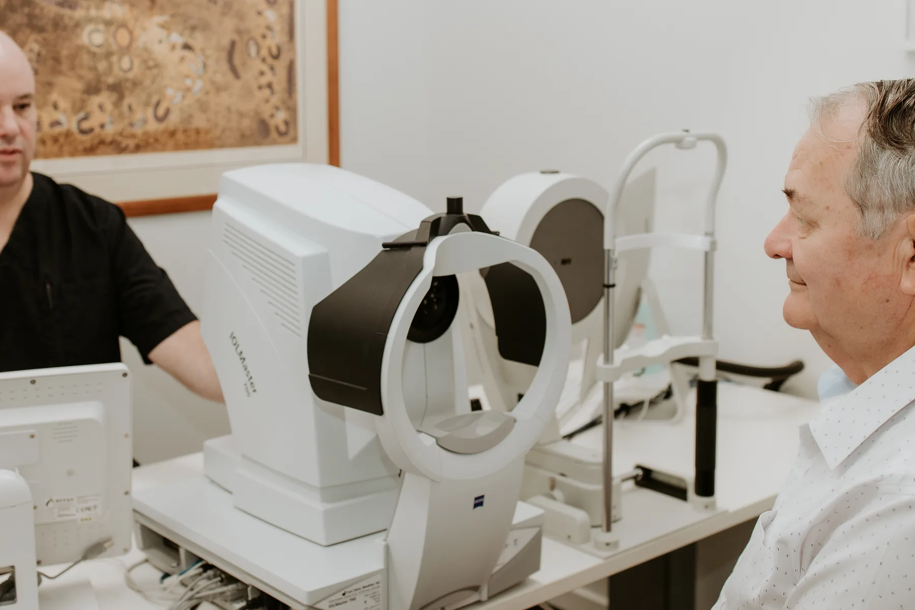 A patient undergoing biometry on the Zeiss IOLMaster 700 at Eye Surgeons Miranda