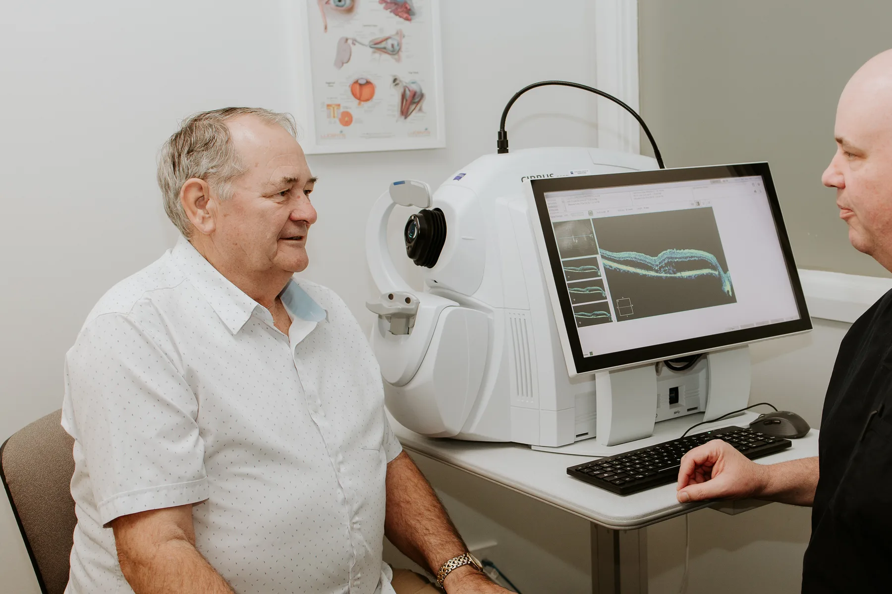 A/Prof Hunt reviewing an OCT scan with a patient on the Zeiss Cirrus 6000 at Eye Surgeons Miranda
